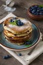 Pancakes with blueberries, mint and powdered sugar Royalty Free Stock Photo