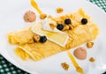 Pancakes with cheese Brie, blueberry and fuagra