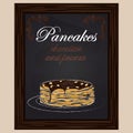 Pancakes with chocolate and peanut on the plate