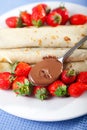 Pancakes with chocolate and strawberries Royalty Free Stock Photo