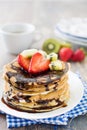 Pancakes with chocolate, strawberries and kiwi Royalty Free Stock Photo