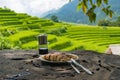 Pancakes and coffee with rice paddy view on the background