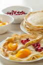 Pancakes with cranberies and peaches served Royalty Free Stock Photo