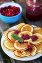 Pancakes with cranberry jam Royalty Free Stock Photo