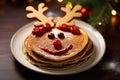 Pancakes decorated to look as a reindeer. Christmas dessert for children. Generative Ai Royalty Free Stock Photo