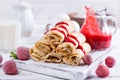 Pancakes filled with cottage cheese and jam for breakfast Royalty Free Stock Photo