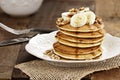 Pancakes with Fresh Bananas and Waluts Royalty Free Stock Photo