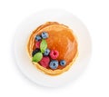Pancakes with fresh berries and maple syrup Royalty Free Stock Photo