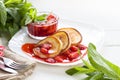 Pancakes with fresh strawberry sauce.Healthy breakfast, white wooden board, mint leaves Royalty Free Stock Photo