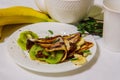 Pancakes with fruits, hot chocolate and powdered sugar Royalty Free Stock Photo