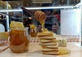 Pancakes with a glass of honey, put on the side,