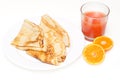 Pancakes with grapefruit juice and clementine