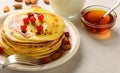 Pancakes with honey and almond Royalty Free Stock Photo