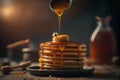 Pancakes with honey and maple syrup on a wooden background. Royalty Free Stock Photo