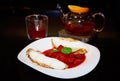 Pancakes with ice cream drizzled with strawberry syrup, with a s Royalty Free Stock Photo