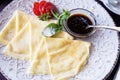 Pancakes with jam, strawberries close-up Royalty Free Stock Photo