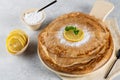 Pancakes with lemon and sugar. Traditional for Shrove Tuesday. Pancake day. Pancakes with lemon juice and powdered sugar Royalty Free Stock Photo