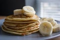 Pancakes with maple syrup and bananas