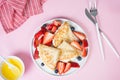 Pancakes on a pink background, top view, close-up, flatlay Royalty Free Stock Photo