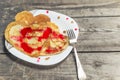 Pancakes on a plate in the form of hearts