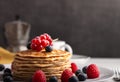Pancakes with raspberries and blueberries