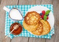 Pancakes with raspberry, blueberry, milk and honey syrup Royalty Free Stock Photo