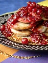 Pancakes with red currant jam Royalty Free Stock Photo