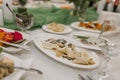 pancakes with salmon fish on a plate on a table in a restaurant Royalty Free Stock Photo