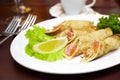 Pancakes with a salmon on a plate Royalty Free Stock Photo