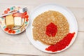 Pancakes with salmon roy caviar