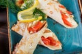 Pancakes with smoked salmon and cream cheese on plate close up. Royalty Free Stock Photo