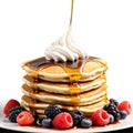 Pancakes A stack of fluffy pancakes, drizzled with warm maple syrup and topped with fresh berries Royalty Free Stock Photo