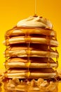 Pancakes stack with ice cream and oozing honey. Generative Ai image