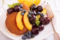 Pancakes with stone fruits Royalty Free Stock Photo