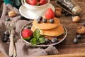pancakes with strawberries and blueberries for breakfast