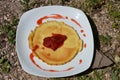 Pancakes with fresh strawberries on white plate Royalty Free Stock Photo