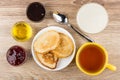Pancakes, strawberry jam, honey, condensed milk with cacao, sour Royalty Free Stock Photo