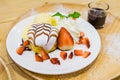 Pancakes with Strawberry and Vanilla Ice cream with chocolate to Royalty Free Stock Photo