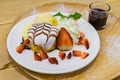 Pancakes with Strawberry and Vanilla Ice cream with chocolate to Royalty Free Stock Photo