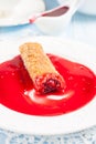 Pancakes stuffed with cherries and cherry sauce Royalty Free Stock Photo