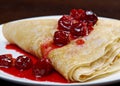 Pancakes with sweet cherry confiture Royalty Free Stock Photo
