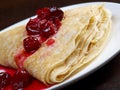 Pancakes with sweet cherry confiture Royalty Free Stock Photo