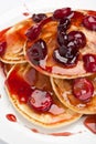 Pancakes with sweet cherry sauce