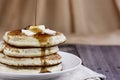 Pancakes and Syrup Being Poured Royalty Free Stock Photo