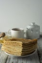 Pancakes. Thin pancakes. Russian bliny. Healthy tasty breakfast - pancakes, a cup of tea and honey. Copy space Royalty Free Stock Photo