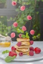 Pancakes with wild berries on the table. Healthy breakfast. Royalty Free Stock Photo