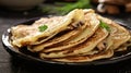 Pancakes. Yellow stuffed pancakes with mushrooms and sour cream. light background