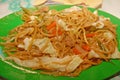 Pancit noodles with mixed vegetables on plate serve in the eatery in Philippines Royalty Free Stock Photo