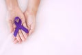 Pancreatic Cancer, world Alzheimer, epilepsy, lupus and domestic violence day Awareness month, Woman holding purple Ribbon for Royalty Free Stock Photo