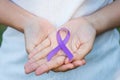 Pancreatic Cancer, world Alzheimer, epilepsy, lupus and domestic violence day Awareness month, Woman holding purple Ribbon for Royalty Free Stock Photo